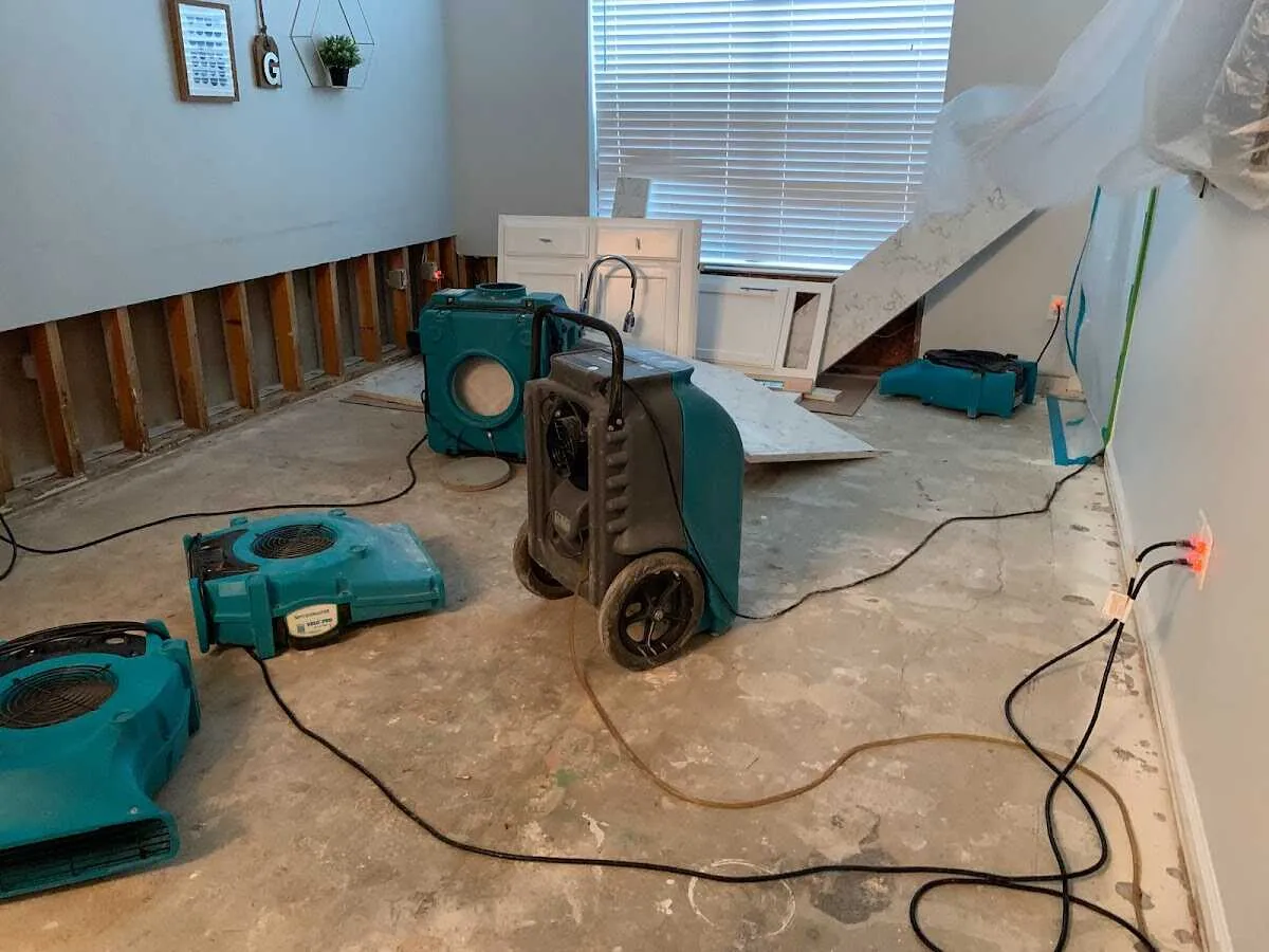 Dehumidifier in flood-cut room for Water Damage Restoration in Anna